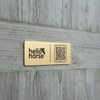 Gold Hello Horse plate on grey wood